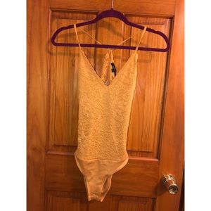 Mustard lace yellow body suit with open back
